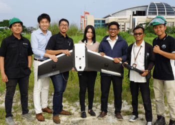 Terra Drone's crew members in Indonesia with the Terra Wing drone. PHOTO from Terra Drone