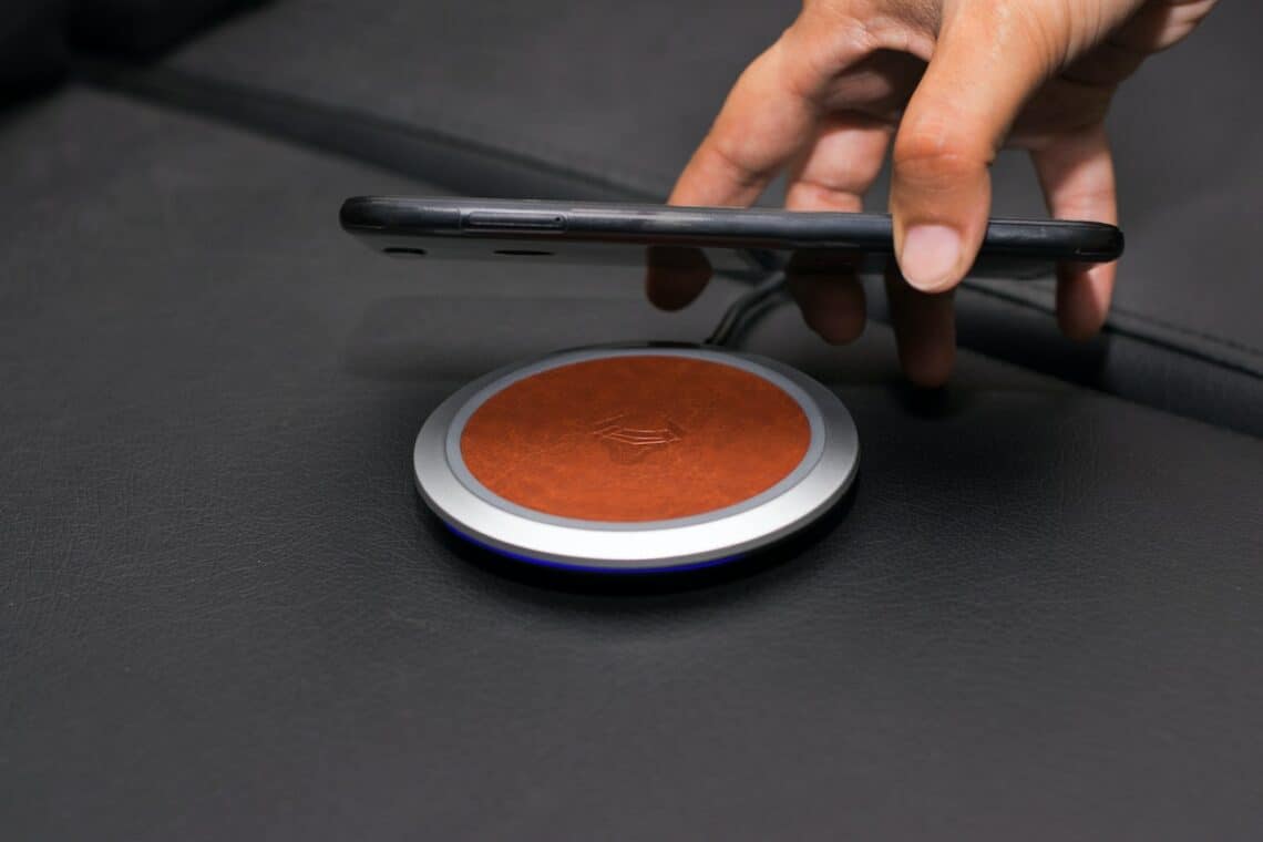 Photo by Rann Vijay: https://www.pexels.com/photo/close-up-of-person-putting-smartphone-on-wireless-charger-7952558/