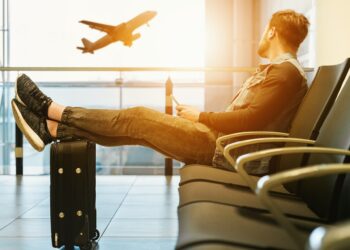 Photo by JESHOOTS.com: https://www.pexels.com/photo/man-in-airport-waiting-for-boarding-on-plane-1201995/