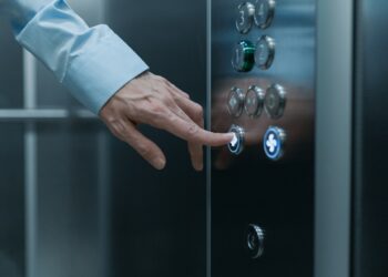 Photo by cottonbro studio: https://www.pexels.com/photo/close-up-shot-of-a-hand-pressing-an-elevator-button-8453040/