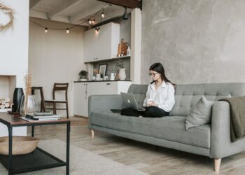 Photo by Vlada Karpovich: https://www.pexels.com/photo/woman-sitting-on-a-sofa-while-working-with-laptop-4050293/