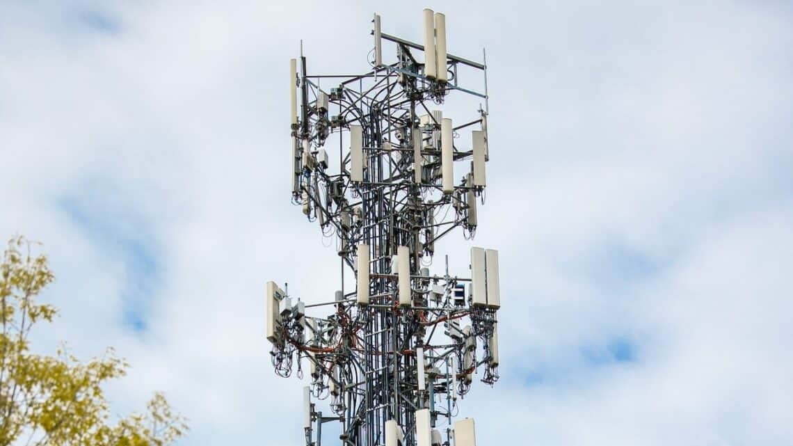 Photo by Caleb Oquendo: https://www.pexels.com/photo/cell-tower-between-trees-under-cloudy-sky-7388500/