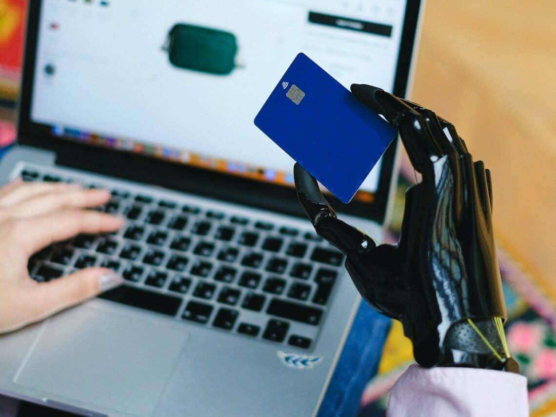 Photo by Anna Shvets: https://www.pexels.com/photo/person-holding-blue-card-on-macbook-pro-5614119/
