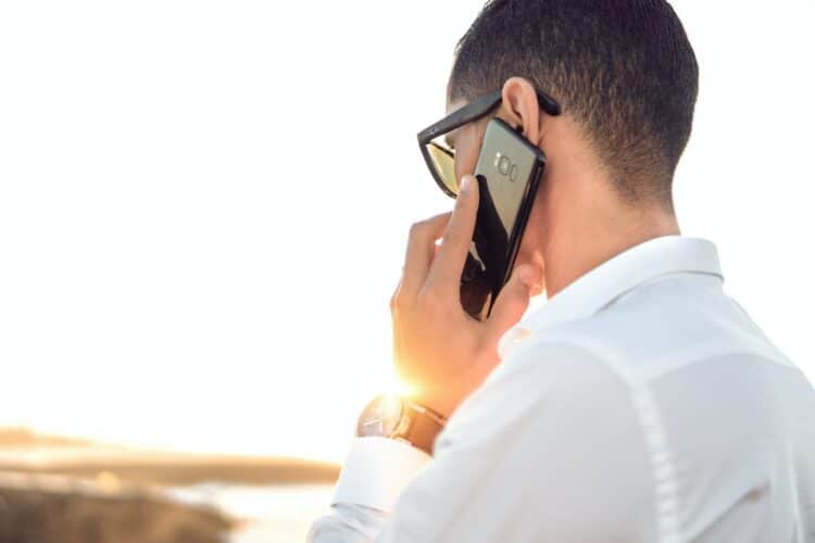 Photo by Hassan OUAJBIR: https://www.pexels.com/photo/shallow-focus-photography-of-a-man-in-white-collared-dress-shirt-talking-to-the-phone-using-black-android-smartphone-804065/