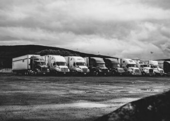 Photo by Kevin Bidwell: https://www.pexels.com/photo/parked-trucks-under-clouds-2348359/