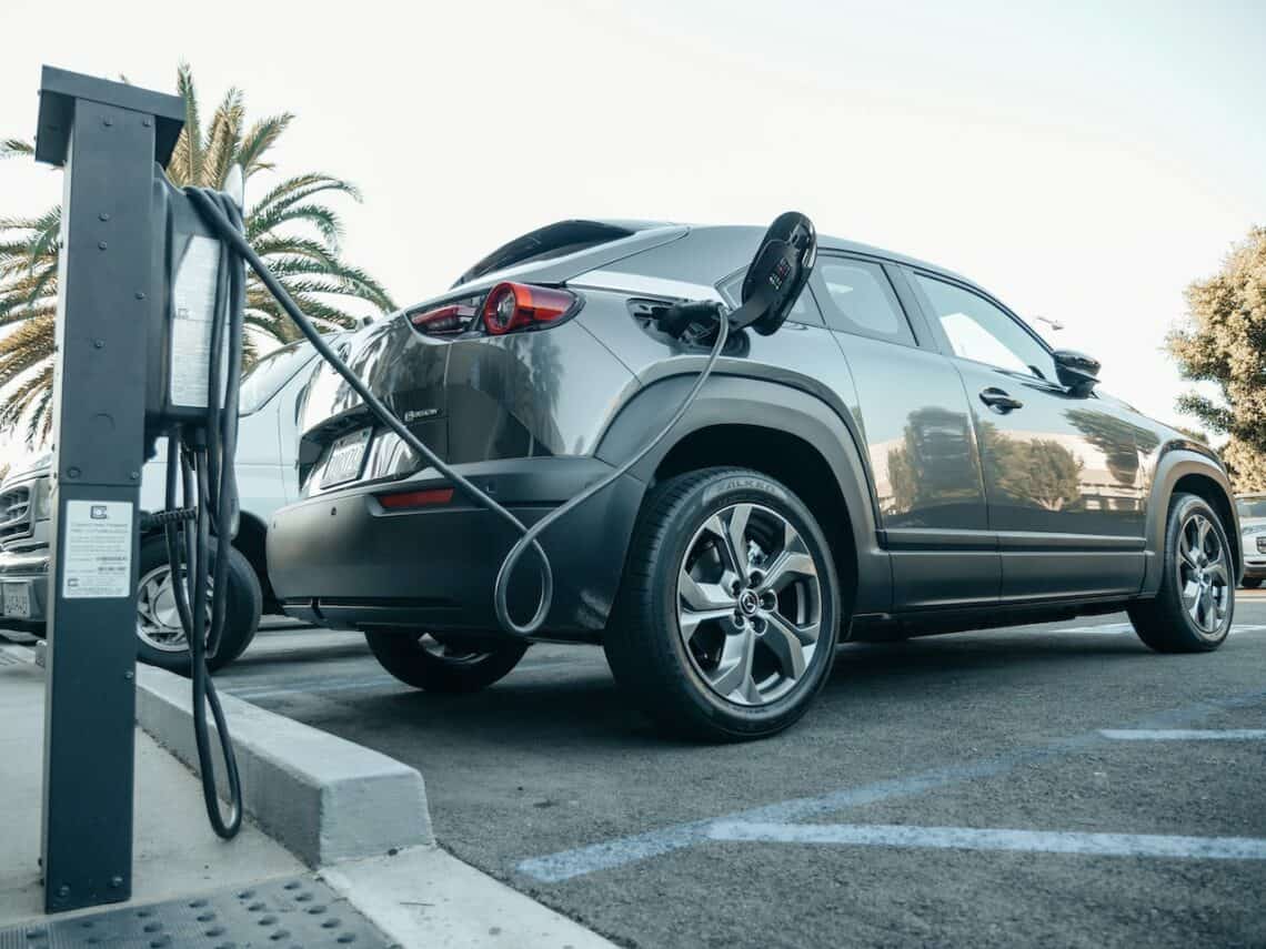 Photo by Kindel Media: https://www.pexels.com/photo/gray-electric-car-parked-on-a-charging-bay-9800006/