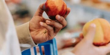 Photo by Michael Burrows: https://www.pexels.com/photo/crop-unrecognizable-man-choosing-peach-and-nectarine-in-supermarket-7129150/