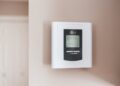 Photo by Erik Mclean: https://www.pexels.com/photo/white-thermostat-hanging-on-the-wall-7616651/