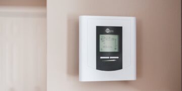 Photo by Erik Mclean: https://www.pexels.com/photo/white-thermostat-hanging-on-the-wall-7616651/