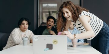 Photo by cottonbro studio: https://www.pexels.com/photo/people-laughing-looking-at-a-laptop-7437495/