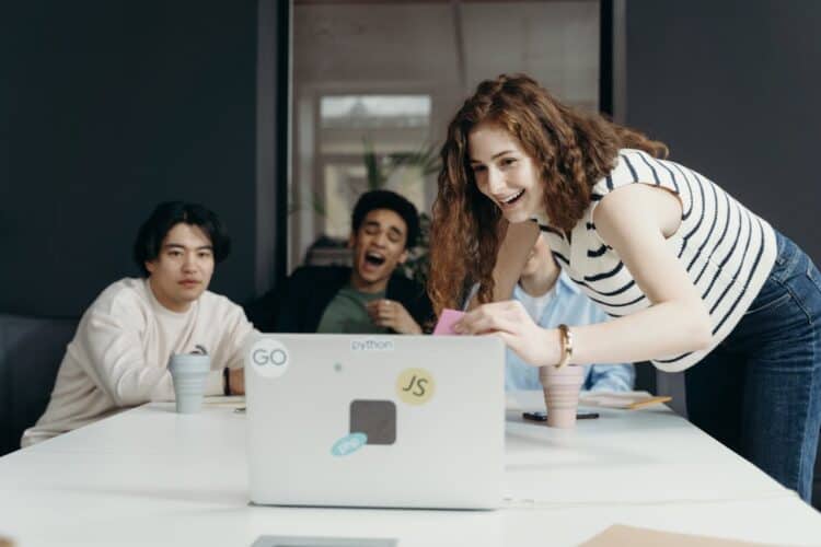 Photo by cottonbro studio: https://www.pexels.com/photo/people-laughing-looking-at-a-laptop-7437495/