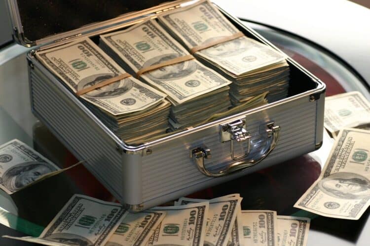 Photo by Pixabay: https://www.pexels.com/photo/hard-cash-on-a-briefcase-259027/