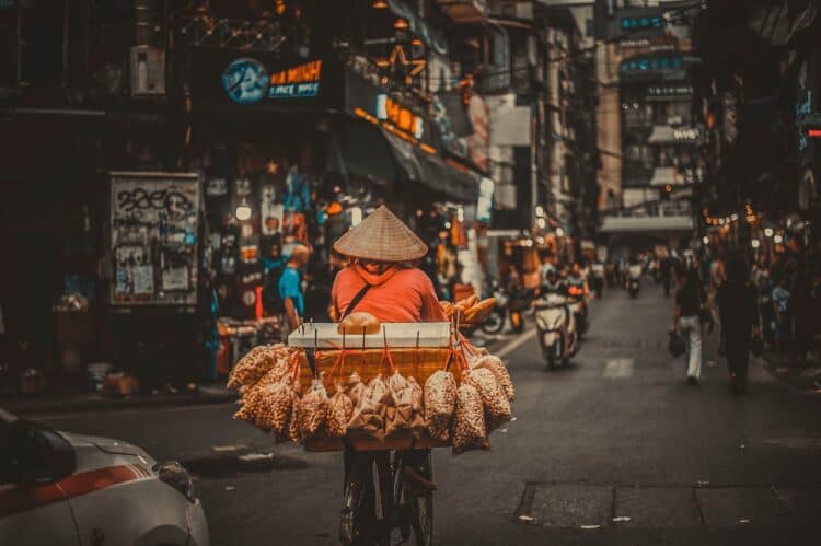 Photo by Sheep .: https://www.pexels.com/photo/photo-of-a-person-selling-snack-on-a-bicycle-2532098/