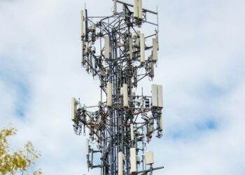 Photo by Caleb Oquendo: https://www.pexels.com/photo/cell-tower-between-trees-under-cloudy-sky-7388500/