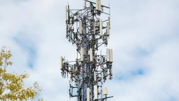 Photo by Caleb Oquendo: https://www.pexels.com/photo/cell-tower-between-trees-under-cloudy-sky-7388500/