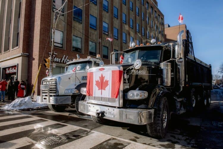 Photo by Harrison Haines: https://www.pexels.com/photo/trucks-on-street-11117646/