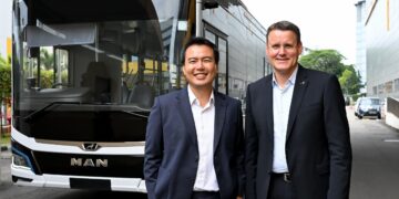 (From left) Hoe Yeen Teck  of ST Engineering and Alexander Vlaskamp of MAN Truck & Bus