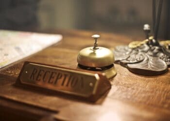 Photo by Andrea Piacquadio: https://www.pexels.com/photo/reception-desk-with-antique-hotel-bell-3771110/