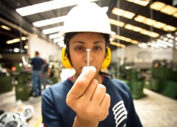 Photo by Alan Quirván: https://www.pexels.com/photo/focused-industrial-worker-holding-a-screw-28297746/