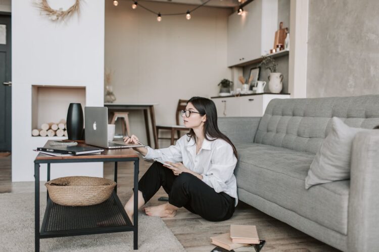 Photo by Vlada Karpovich: https://www.pexels.com/photo/woman-sitting-on-the-floor-while-using-her-laptop-4050294/