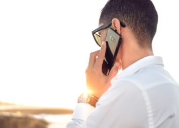 Photo by Hassan OUAJBIR: https://www.pexels.com/photo/shallow-focus-photography-of-a-man-in-white-collared-dress-shirt-talking-to-the-phone-using-black-android-smartphone-804065/