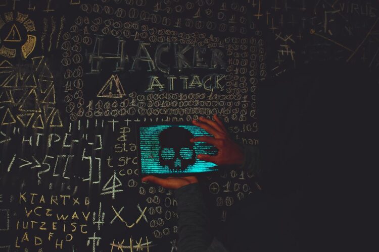 Photo by Lucas Andrade: https://www.pexels.com/photo/a-person-holding-a-tablet-device-with-skull-image-near-blackboard-14066351/