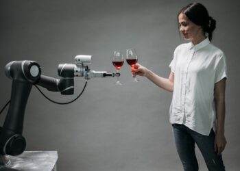 Photo by Pavel Danilyuk: https://www.pexels.com/photo/a-robot-holding-a-wine-8439089/