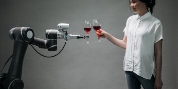 Photo by Pavel Danilyuk: https://www.pexels.com/photo/a-robot-holding-a-wine-8439089/