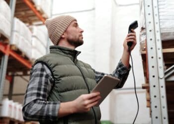 Photo by Tiger Lily: https://www.pexels.com/photo/photo-of-a-man-scanning-products-in-a-warehouse-4483942/