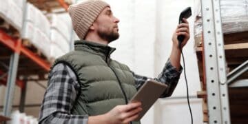 Photo by Tiger Lily: https://www.pexels.com/photo/photo-of-a-man-scanning-products-in-a-warehouse-4483942/