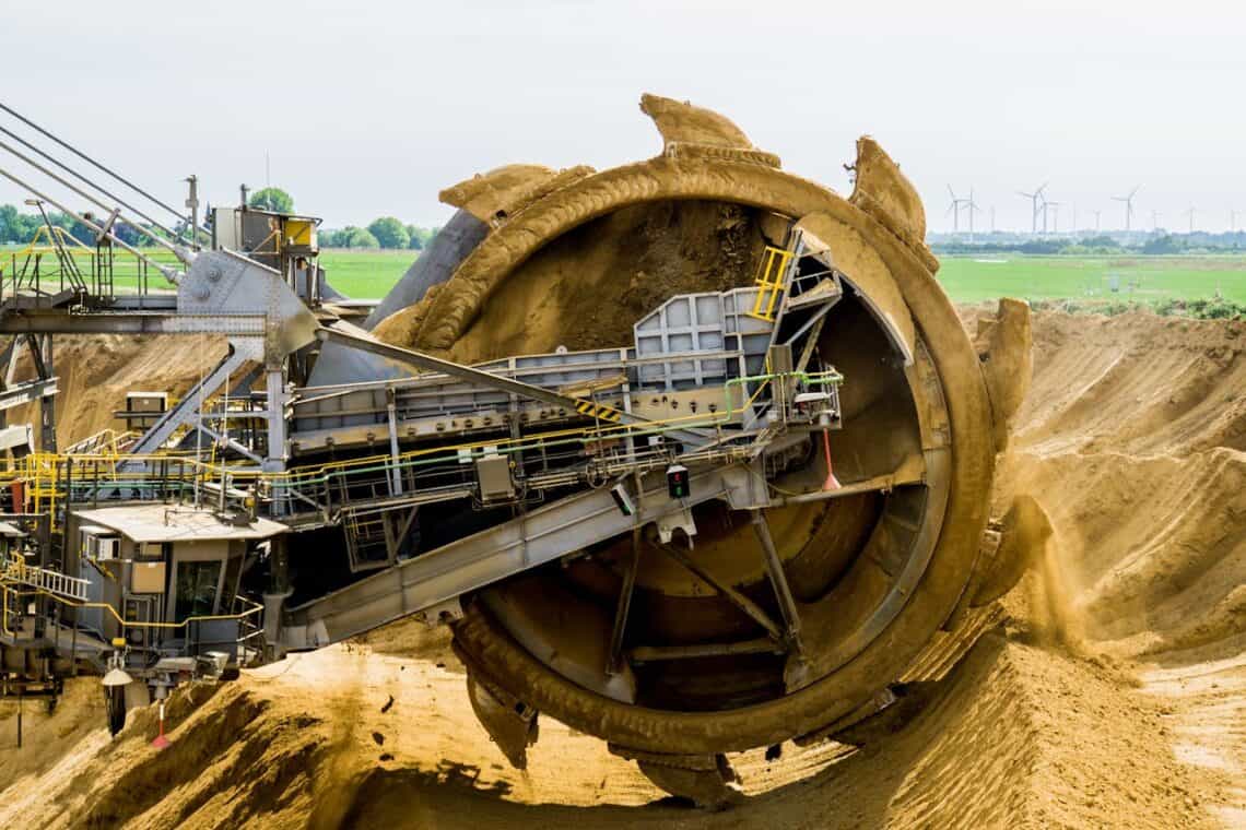 Photo by Pixabay: https://www.pexels.com/photo/round-brown-and-grey-metal-heavy-equipment-on-sand-33192/