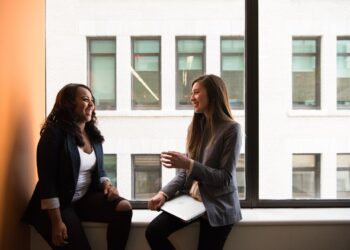 Photo by Christina Morillo: https://www.pexels.com/photo/woman-in-gray-formal-coat-sitting-near-black-full-glass-panel-window-1181562/