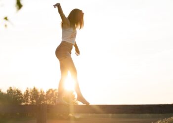 Photo by Sebastian V.: https://www.pexels.com/photo/woman-walking-on-fence-1548769/