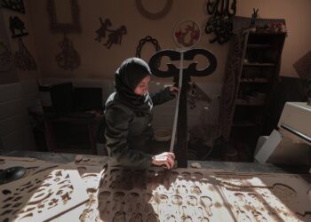 Photo by Hosny salah: https://www.pexels.com/photo/woman-in-hijab-working-in-workshop-13748649/