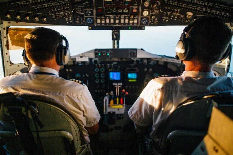 Photo by Kelly    : https://www.pexels.com/photo/two-pilots-flying-an-airplane-2898316/