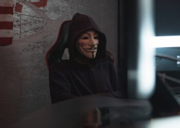 Photo by Tima Miroshnichenko: https://www.pexels.com/photo/person-in-black-hoodie-hacking-a-computer-system-5380647/