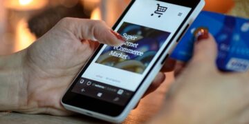 Photo by AS Photography: https://www.pexels.com/photo/person-using-black-and-white-smartphone-and-holding-blue-card-230544/