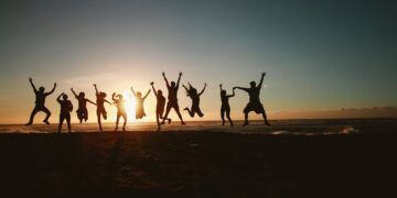 Photo by Belle Co: https://www.pexels.com/photo/silhouette-photography-of-group-of-people-jumping-during-golden-time-1000445/