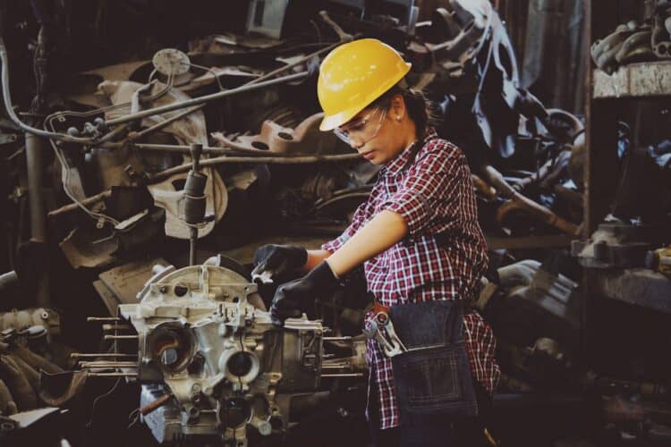 Photo by Chevanon Photography: https://www.pexels.com/photo/woman-wears-yellow-hard-hat-holding-vehicle-part-1108101/