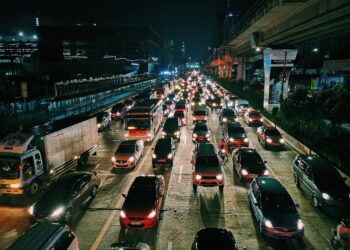 Photo by Mikechie Esparagoza: https://www.pexels.com/photo/photo-of-vehicles-on-road-during-evening-1600757/