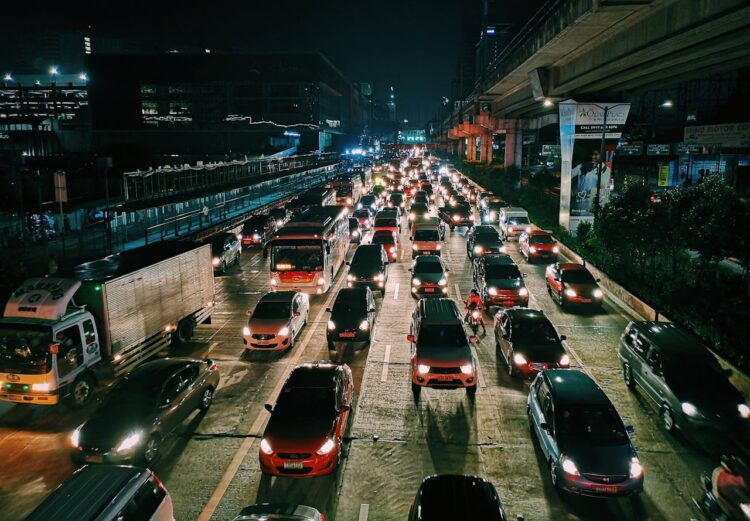 Photo by Mikechie Esparagoza: https://www.pexels.com/photo/photo-of-vehicles-on-road-during-evening-1600757/
