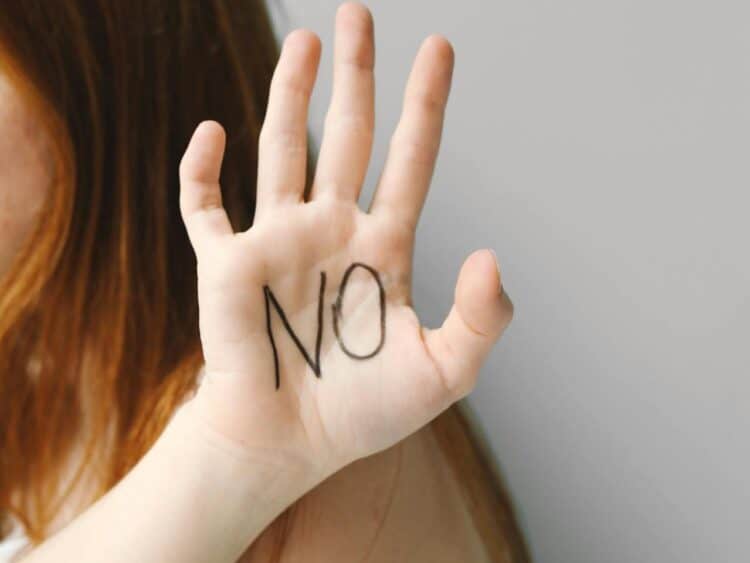 Photo by Polina Tankilevitch: https://www.pexels.com/photo/hand-of-a-woman-showing-palm-with-a-word-no-4830656/
