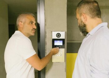 Photo by Meruyert Gonullu: https://www.pexels.com/photo/a-man-showing-a-digital-keypad-on-a-concrete-wall-8978630/