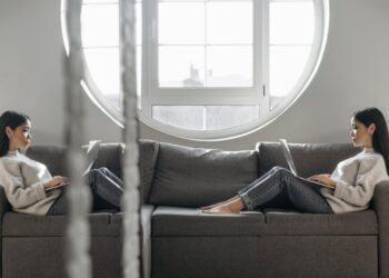 Photo by Pavel Danilyuk: https://www.pexels.com/photo/a-reflection-of-a-woman-using-laptop-while-sitting-on-sofa-7190925/