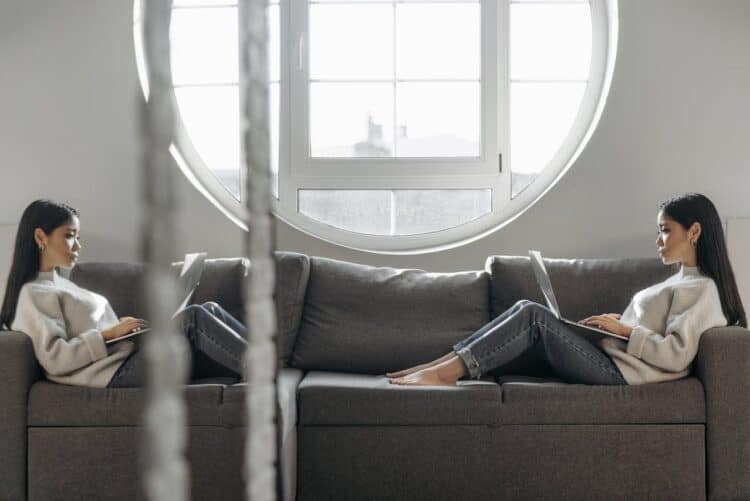 Photo by Pavel Danilyuk: https://www.pexels.com/photo/a-reflection-of-a-woman-using-laptop-while-sitting-on-sofa-7190925/