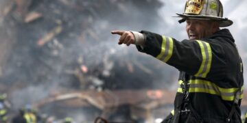 Photo by Pixabay: https://www.pexels.com/photo/fire-fighter-wearing-black-and-yellow-uniform-pointing-for-something-70573/