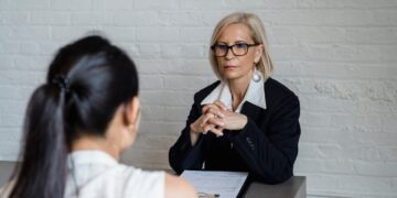 Photo by Timur Weber: https://www.pexels.com/photo/blonde-woman-sitting-with-her-hands-together-8560024/