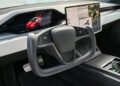 Photo by Vladimir Srajber: https://www.pexels.com/photo/steering-wheel-and-screens-in-tesla-car-interior-17345649/