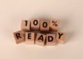Photo by Ann H: https://www.pexels.com/photo/wooden-blocks-displaying-100-ready-message-33090267/