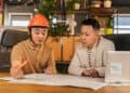 Photo by ANTONI SHKRABA production: https://www.pexels.com/photo/construction-worker-and-an-office-worker-looking-at-papers-together-in-an-office-8278910/